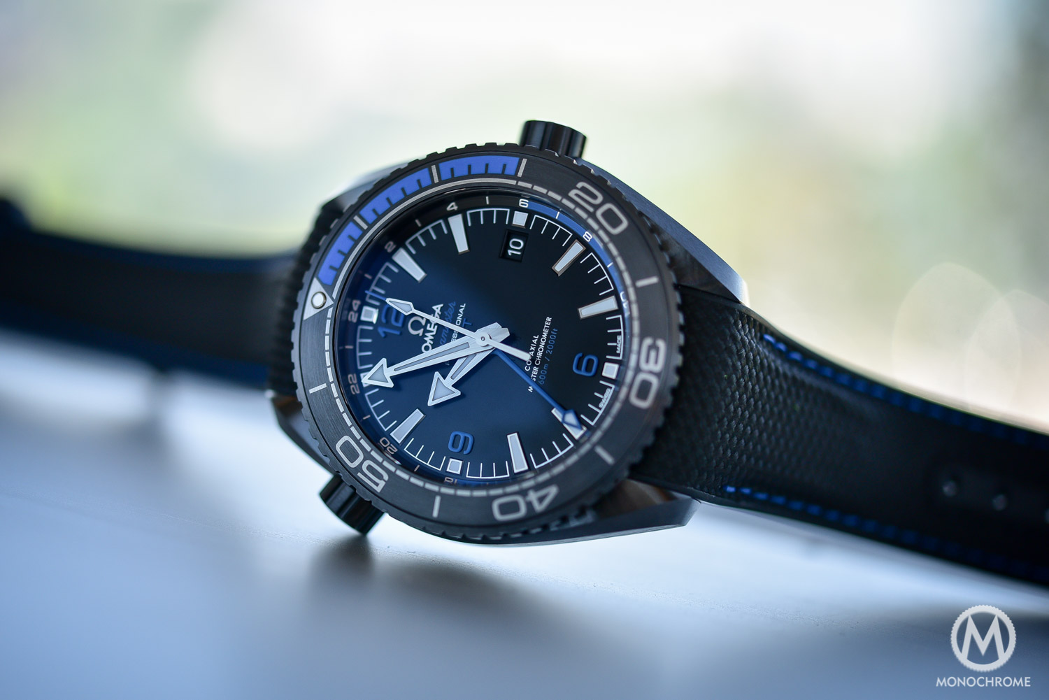 omega seamaster planet ocean deep black price